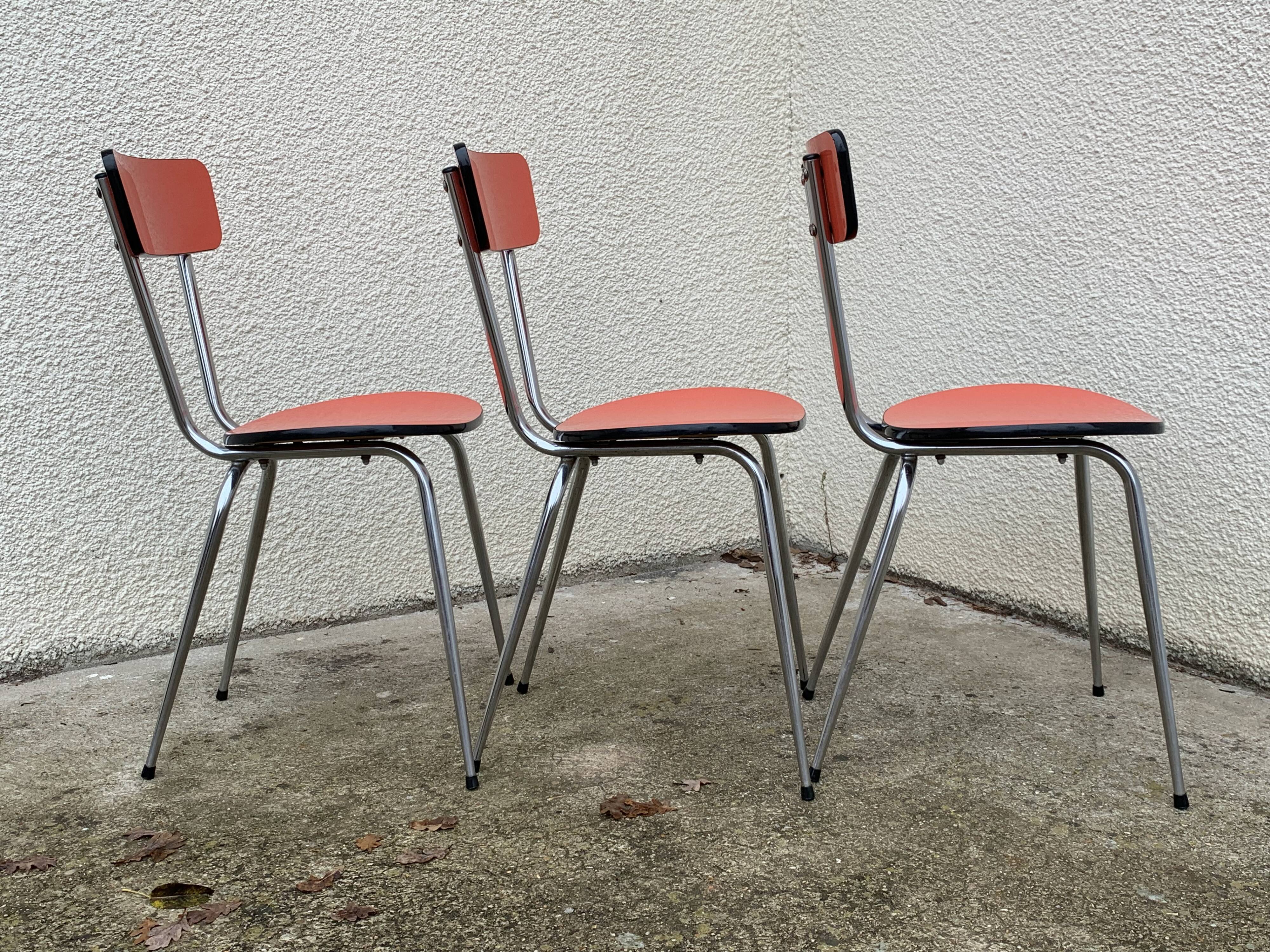 Red formica chairs 1950
