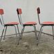 Red formica chairs 1950