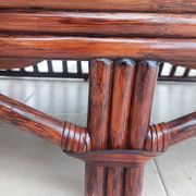 Vintage salon Maison Maugrion in rattan with leather and feather finishes.