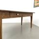 Solid pine farmhouse table, two drawers, fluted legs, France.