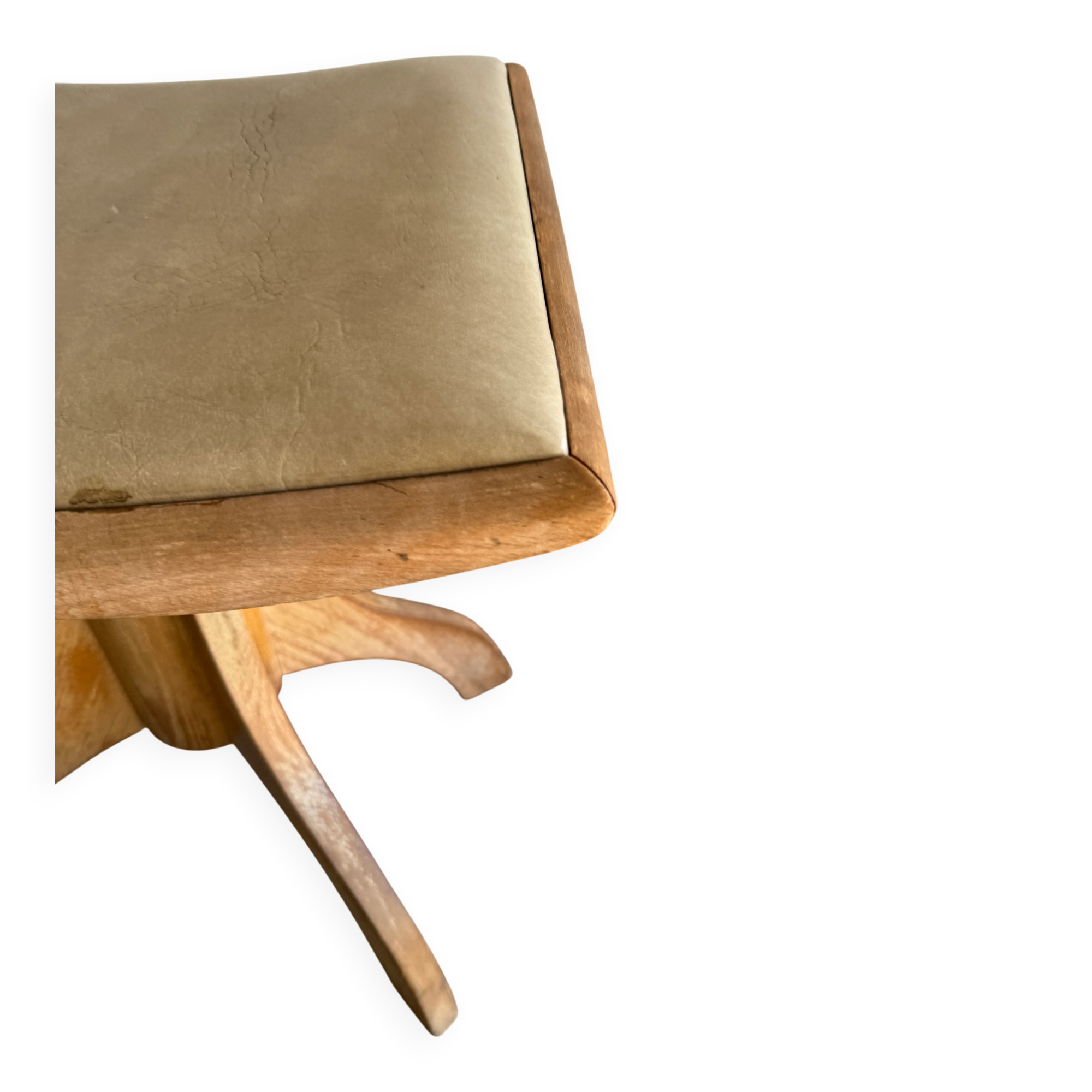 Vintage natural wood stool with light yellow faux leather seat and crossed splayed base