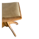 Vintage natural wood stool with light yellow faux leather seat and crossed splayed base