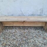 Small raw wood bench