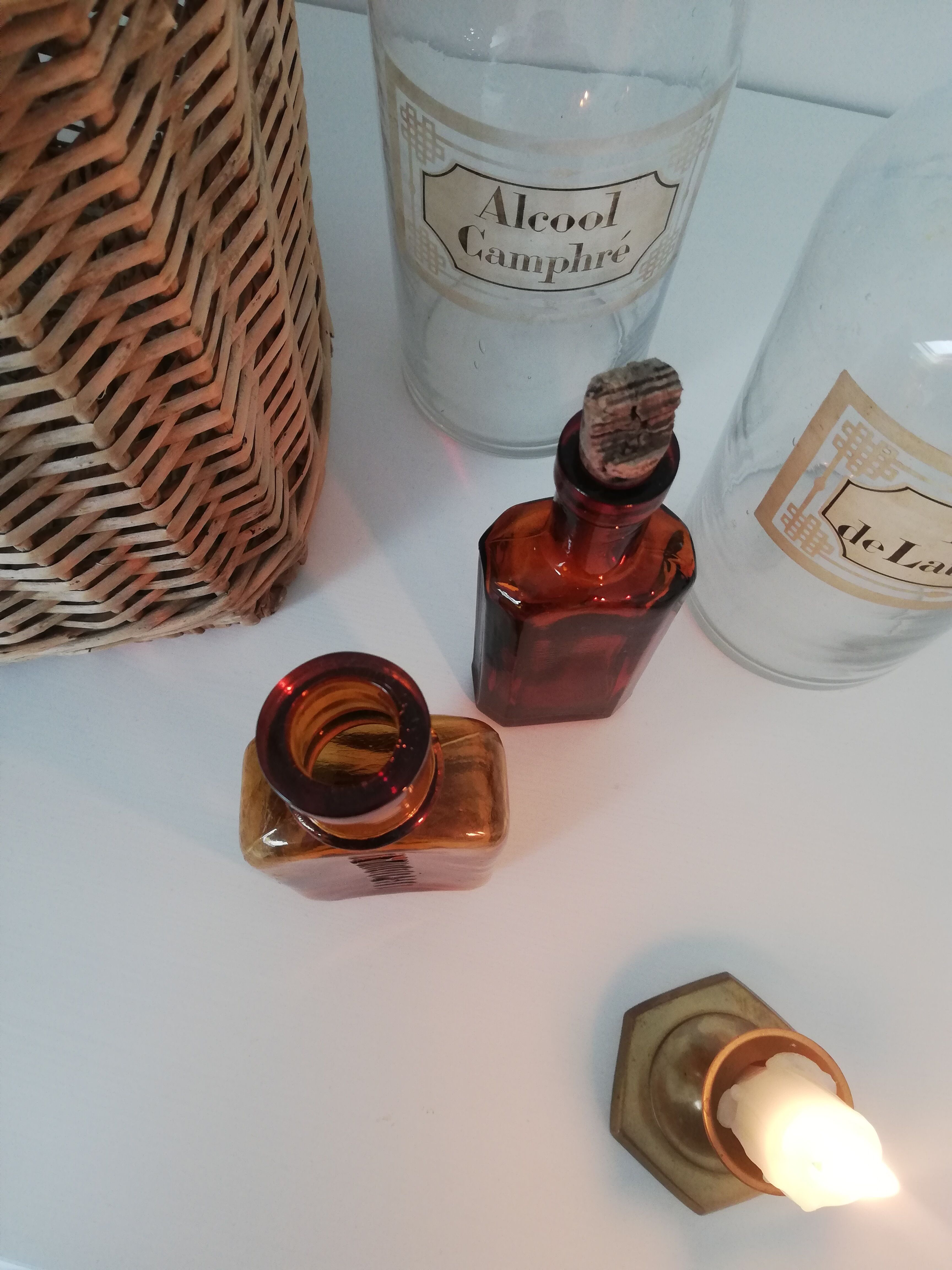 2 amber apothecary bottles