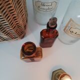 2 amber apothecary bottles