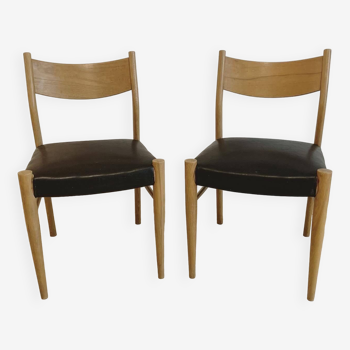 Chaises vintage scandinaves en bois et skaï noir