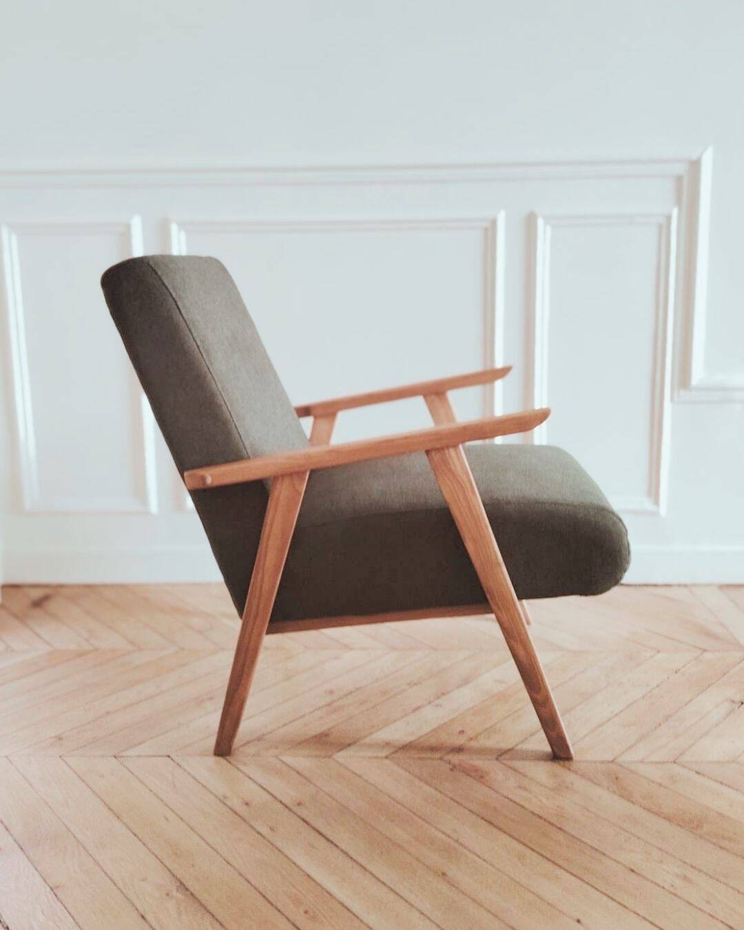 Renovated armchair, Scandinavian style in wood and green fabric.