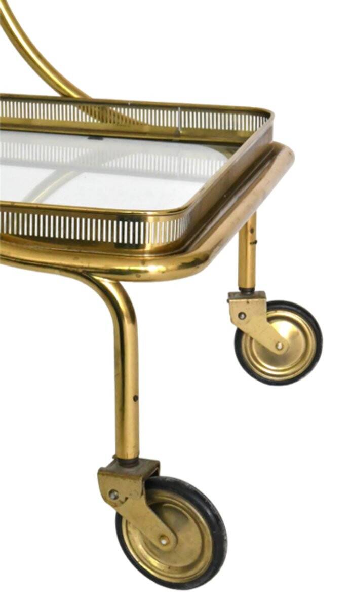 Bronze and gilded brass rolling bar attributed to Maison Bagues.