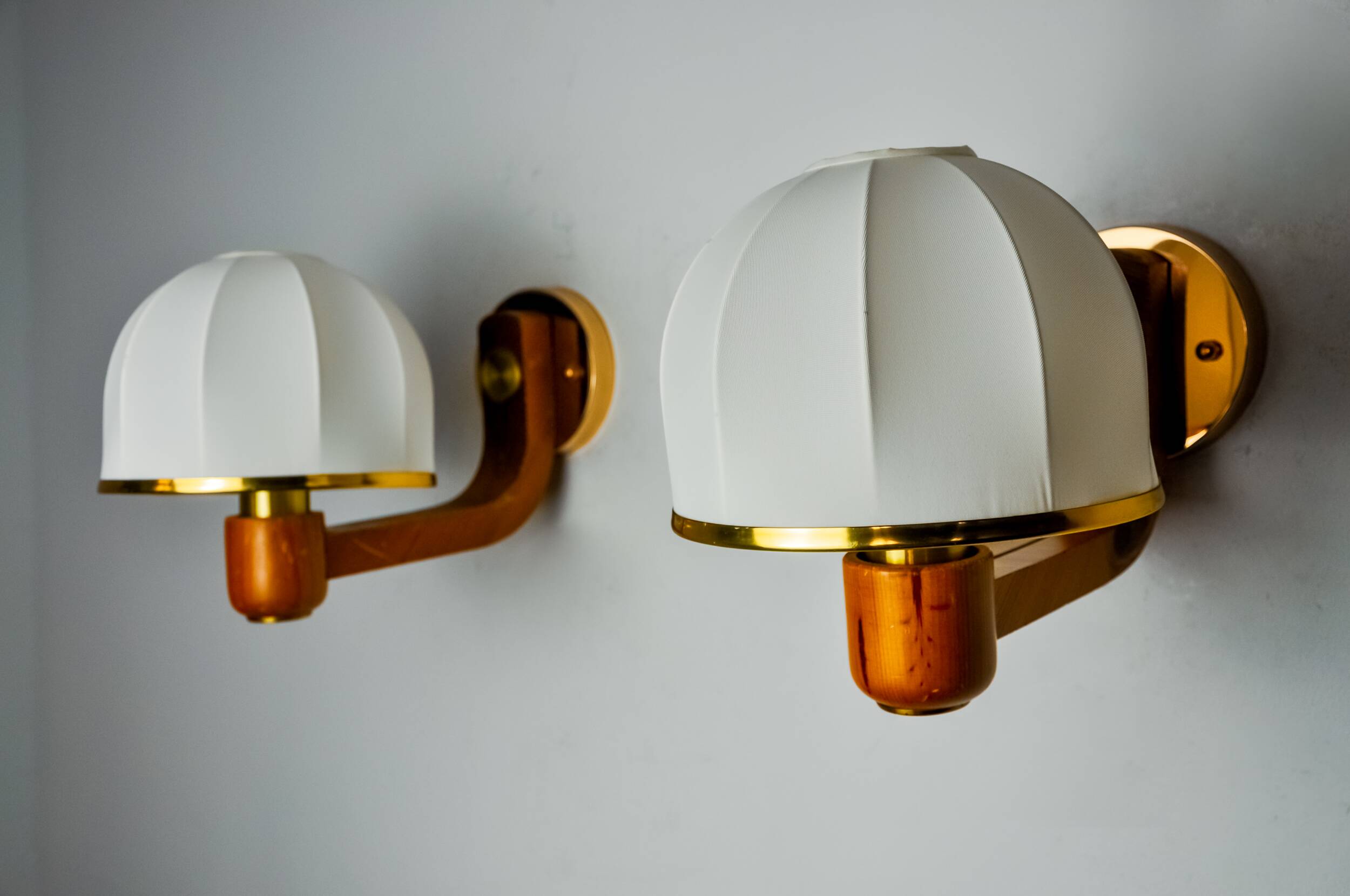 Pair of regency wall lights, pine and stretched canvas, Italy, 1970