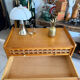 Vintage wooden and rattan chest of drawers with tapered legs.