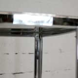 Living table. chrome metal, curved smoked glass slab, france, circa 1970.