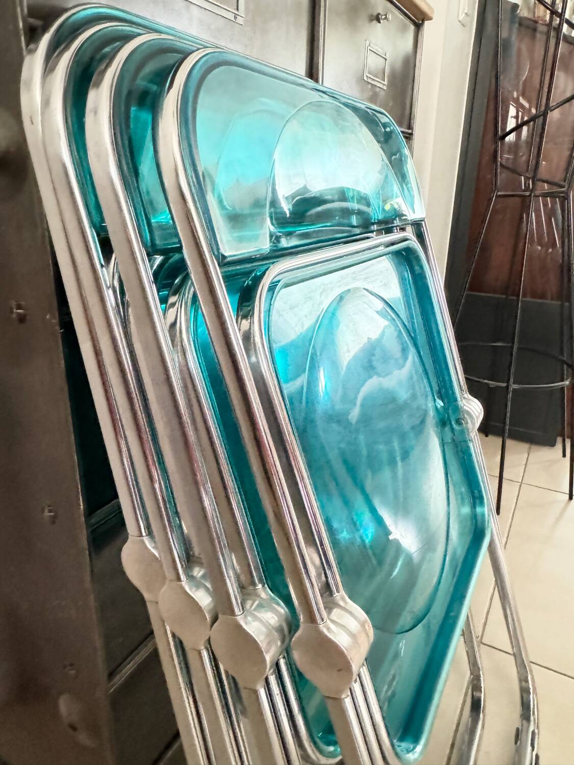 Set of 4 blue Plia folding chairs by Castelli