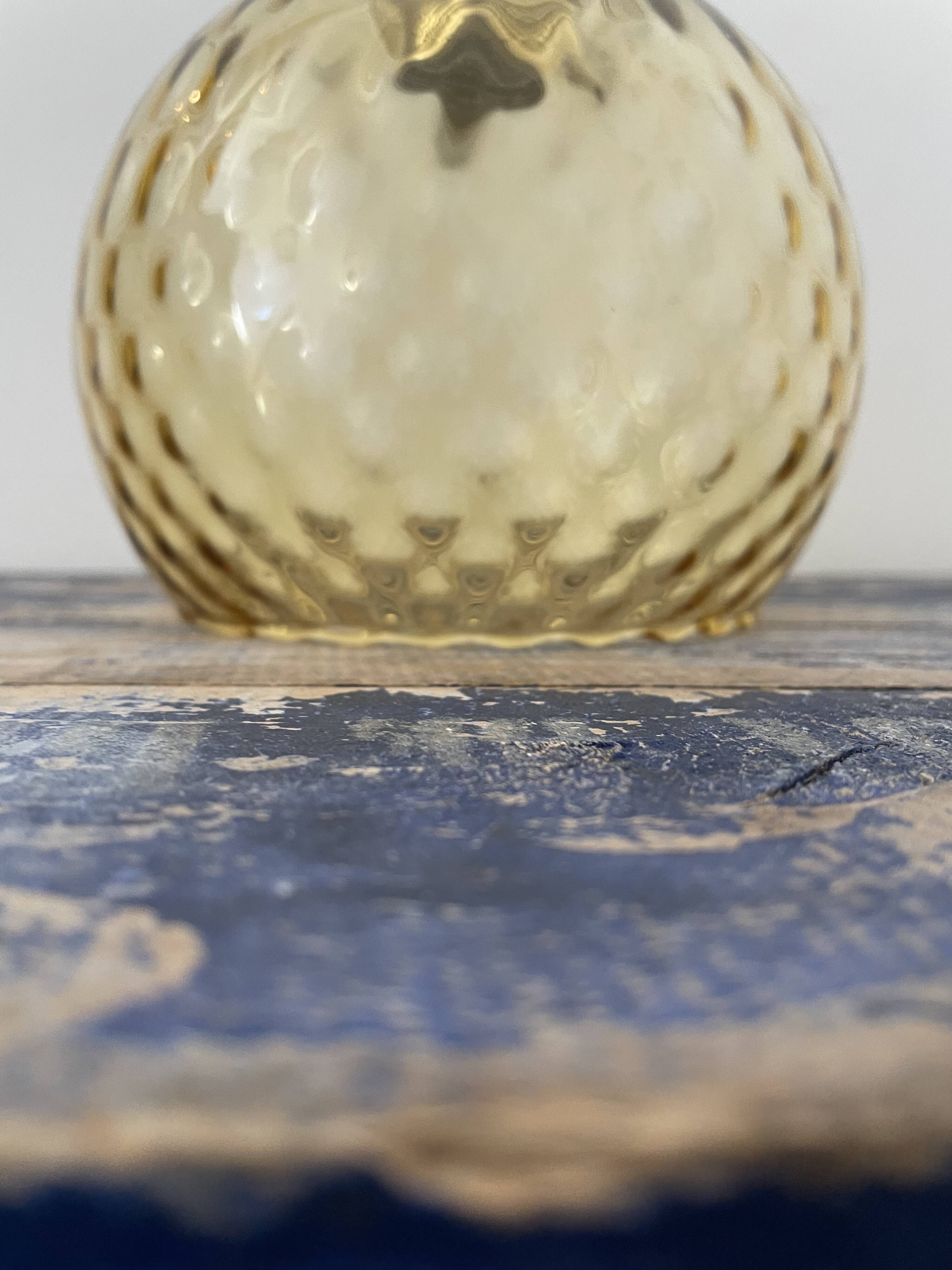 New electrified golden globe wall lamp