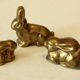 3 solid brass paperweights in the shape of rabbits vintage from the 1960s