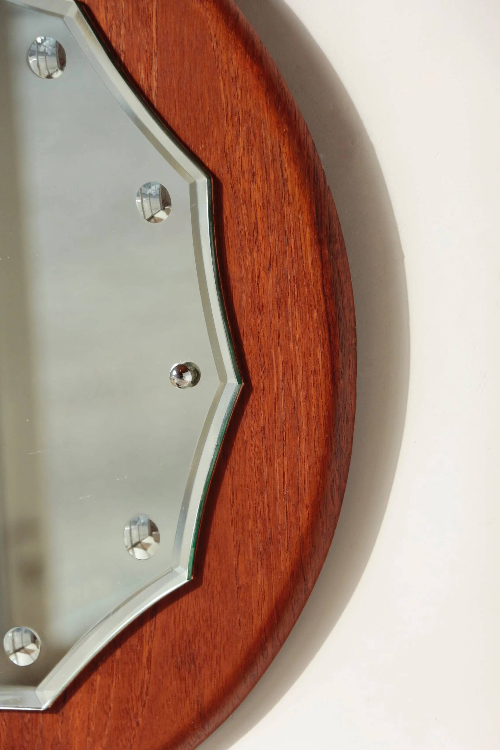 Vintage round teak mirror from the 1960s.