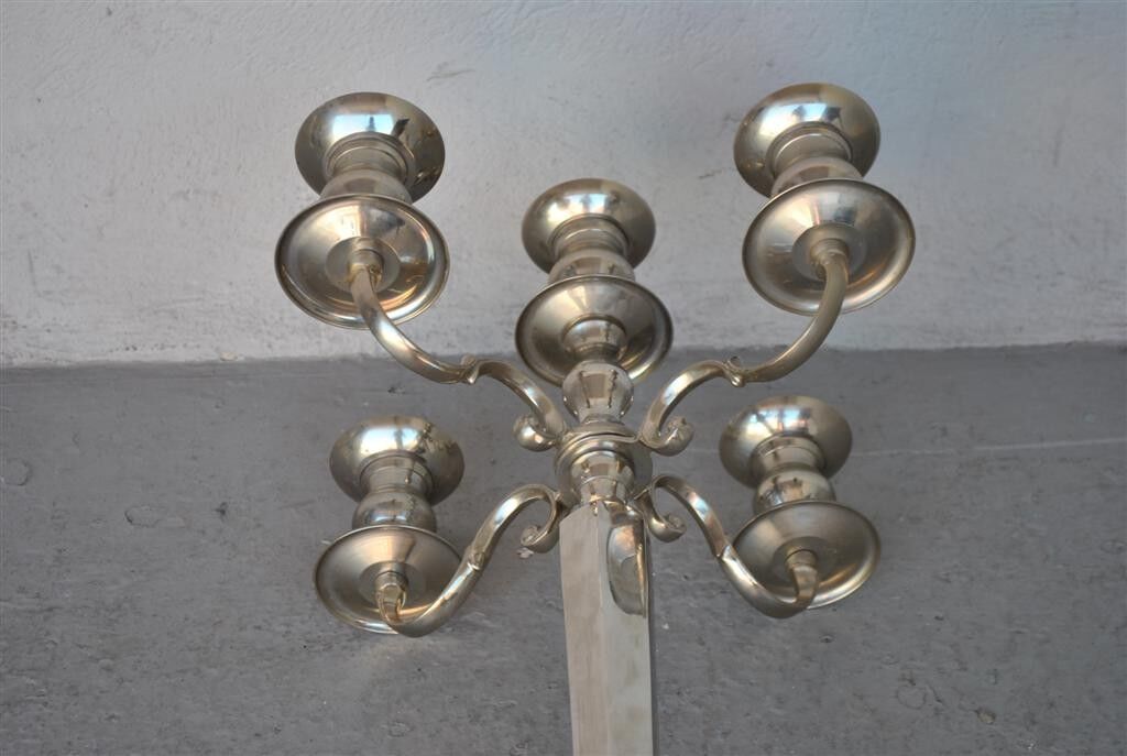 Pair of candlesticks on silver feet