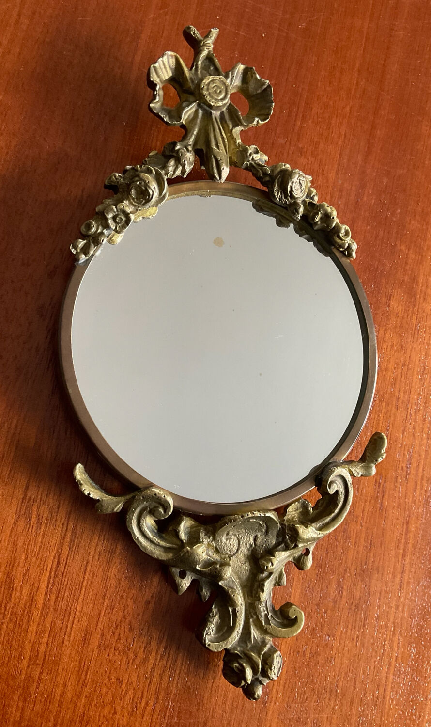 Antique small bronze mirror in Louis XIV style