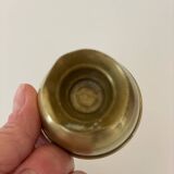 4 golden brass egg cups