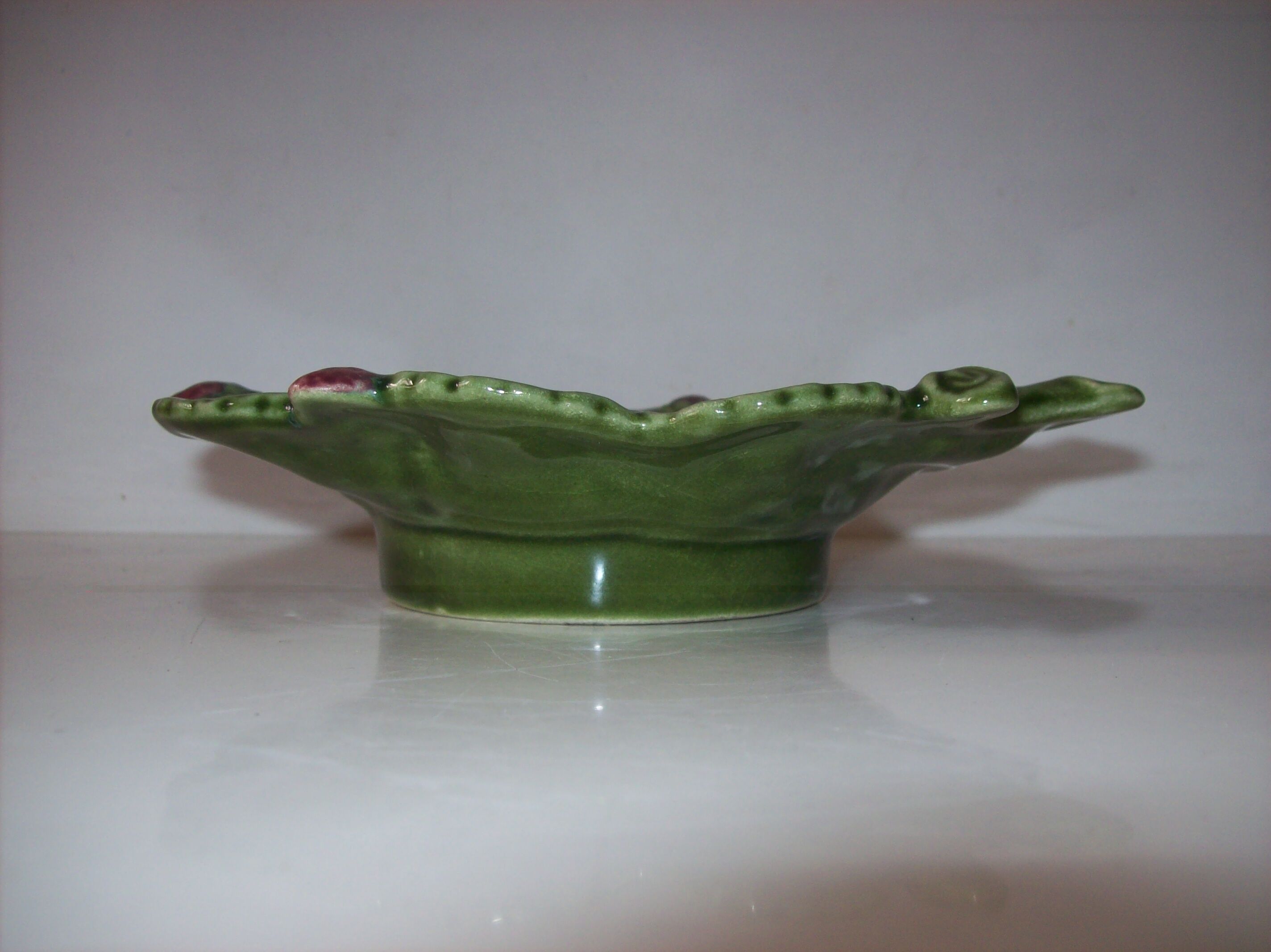 Tidy with raspberry decoration