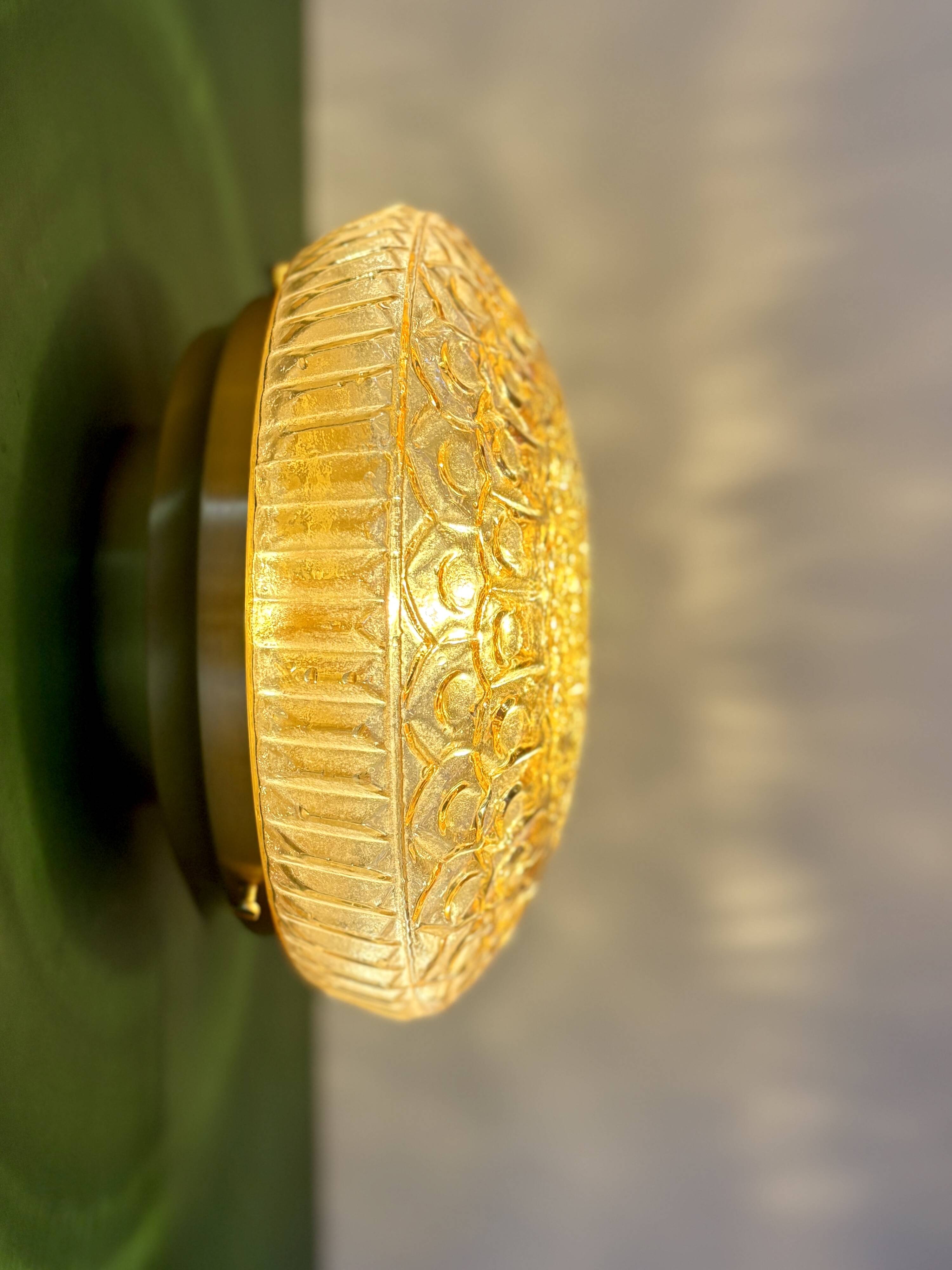 Vintage amber glass globe wall/ceiling light.