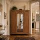 Art deco wardrobe in raw oak with bevelled mirror.