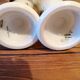 2 porcelain mazagrans decorated with feathers
