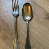 Two sets of silver-plated cutlery.
