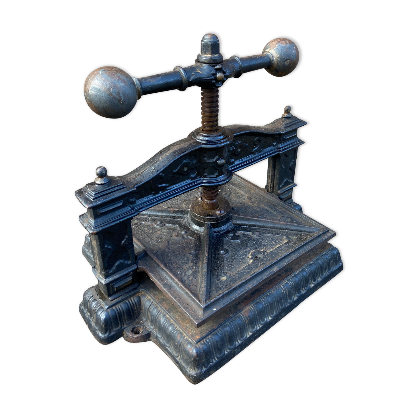 Old printing press in very old cast iron