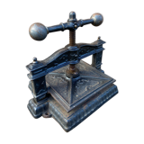 Old printing press in very old cast iron