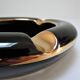 Black ceramic ashtray and vintage gold 50/60