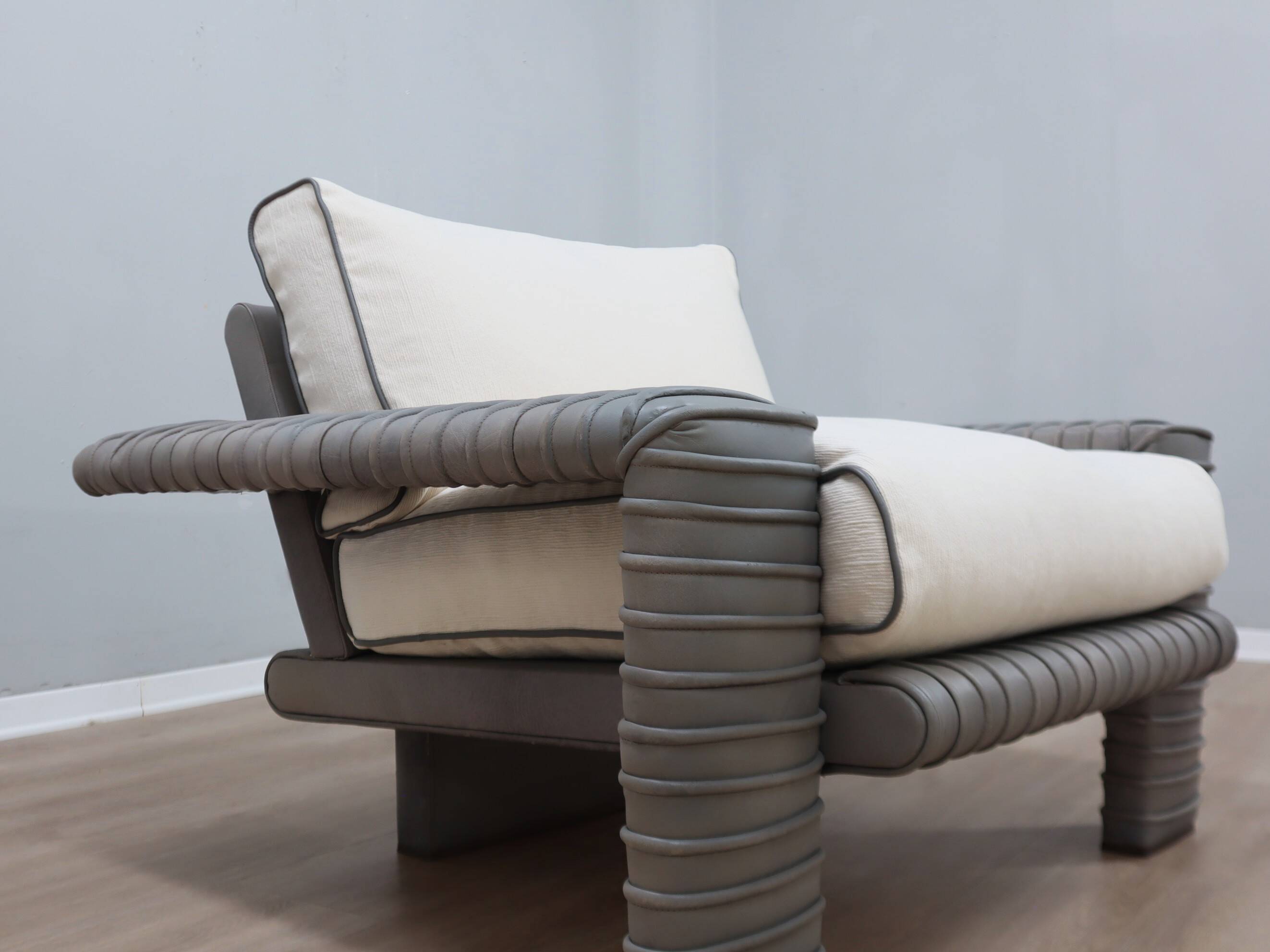 Marzio Cecchi armchair in ribbed Leather and goose down cushions 1970s