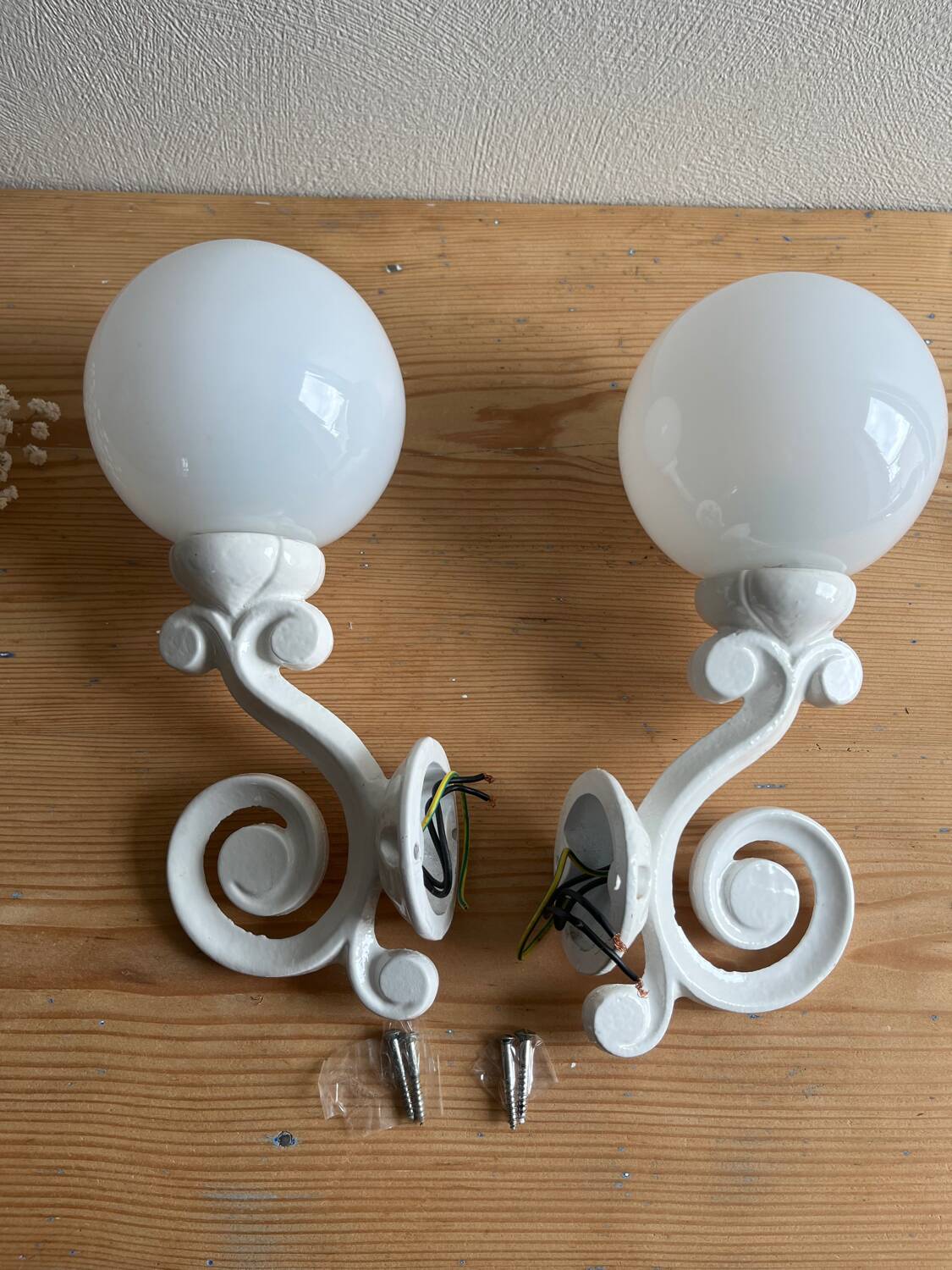 Antique enamelled cast iron wall lights / opaline globe
