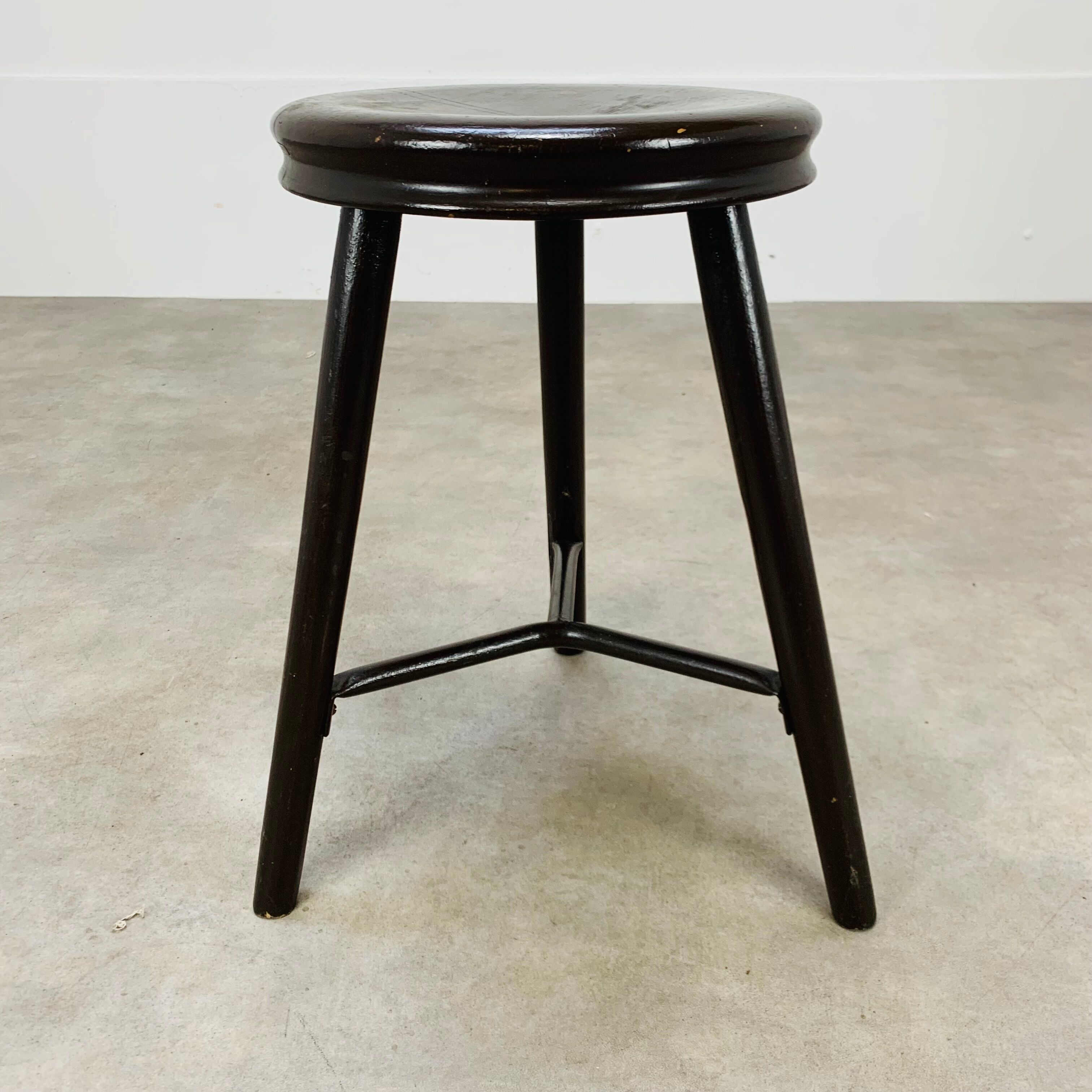 Industrial metal and wood tripod stool