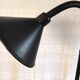 Articulated black metal floor lamp/e-reader – 70s/80s