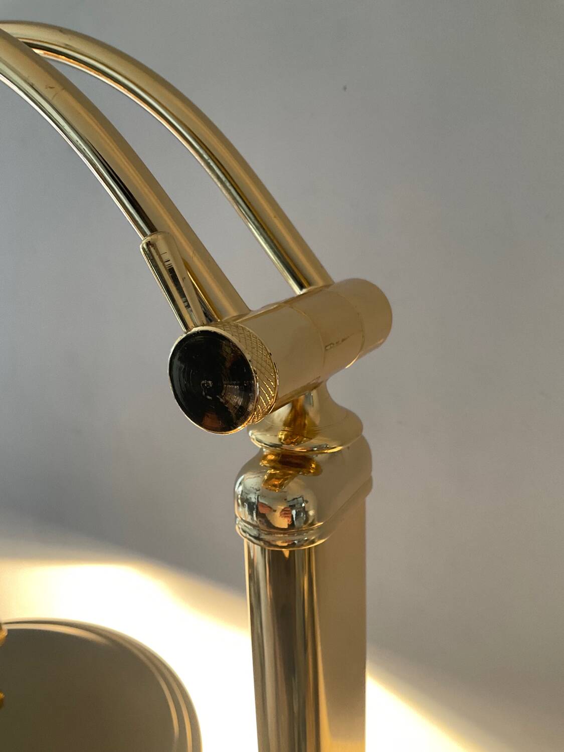 Articulated floor lamp from the 80s in gold metal