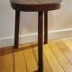 Old wooden tripod bench stool milking shepherd’s bench