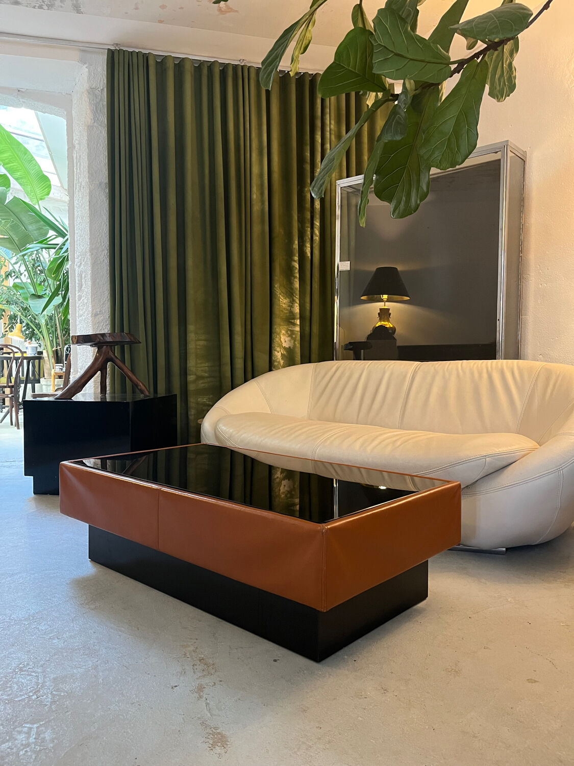 Caramel leather and black glass coffee table