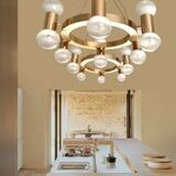 Annular chandelier with gradient white spheres