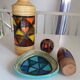Mid-century pattern Vetrata vases and bowls by Aldo Londi for Bitossi Italy. Black, blue, orange and yellow on a brushed background.