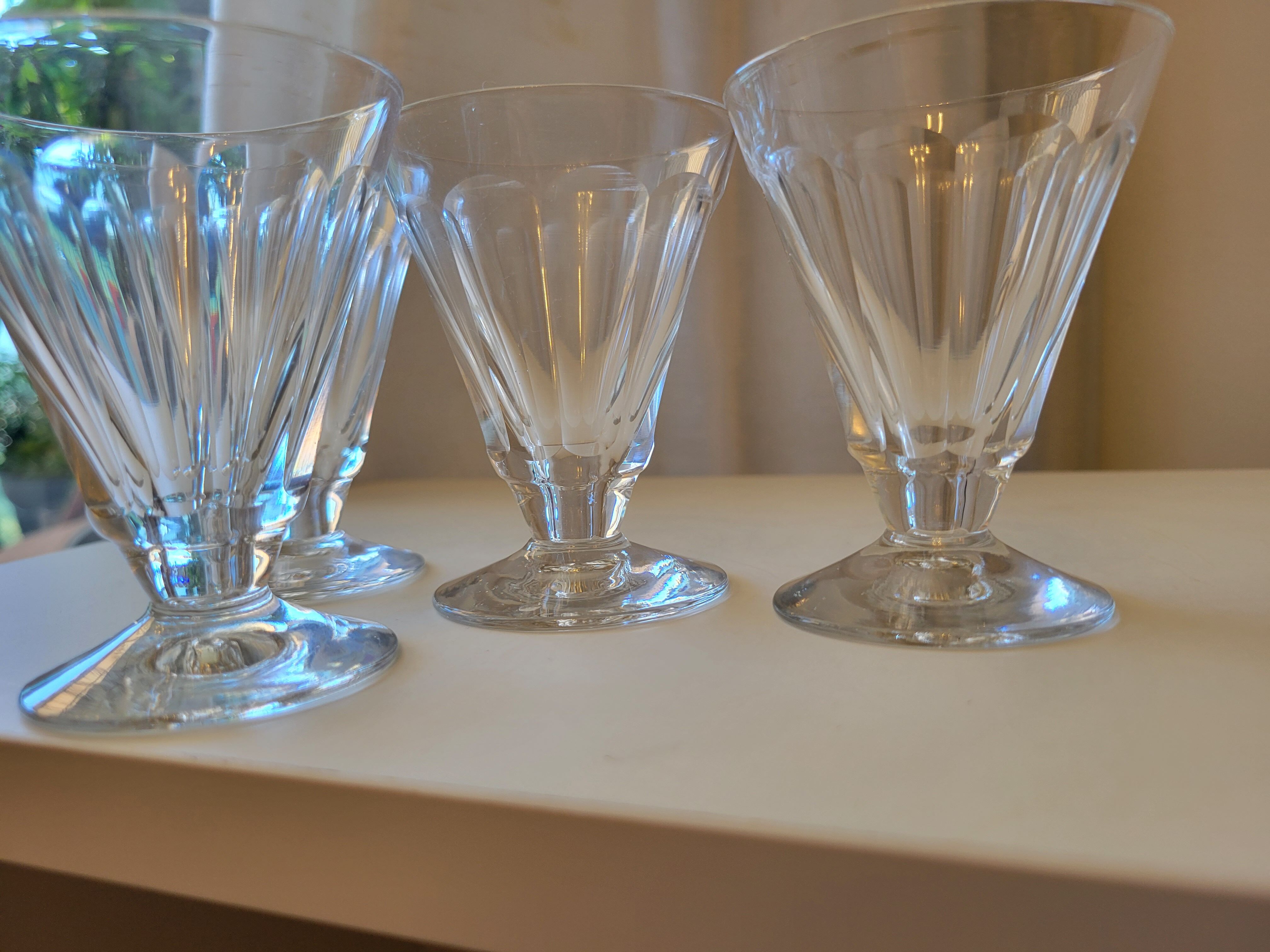 4 old conical liquor glasses cut with 10 flat ribs with faceted sides