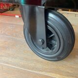 Gae Aulenti coffee table for Fontana Arte, transparent glass top with black cast iron supports, 1980s.