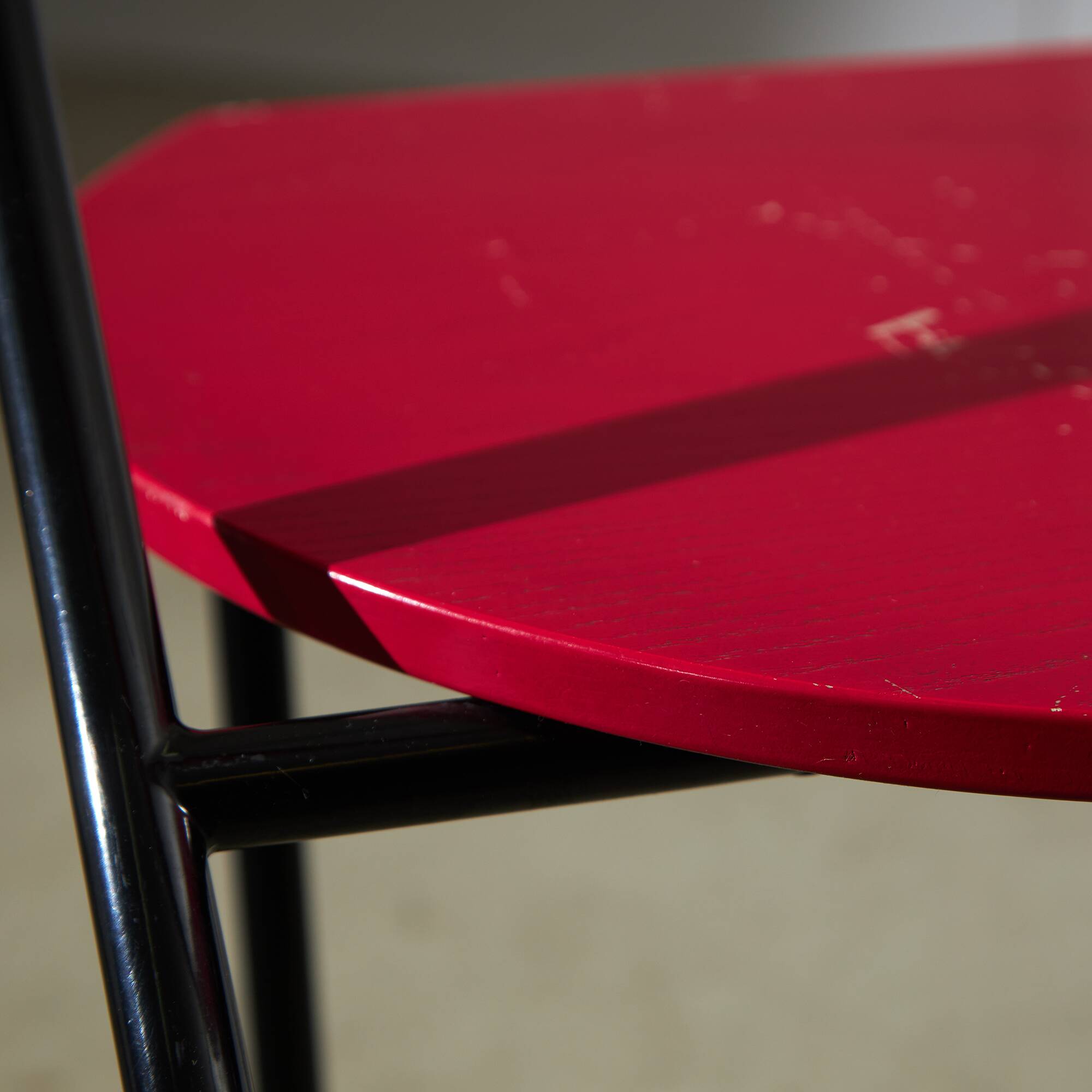 Red Plywood and Curved Metal Frame Chair