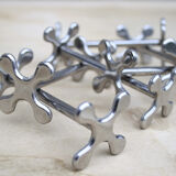 Six vintage metal knife holders
