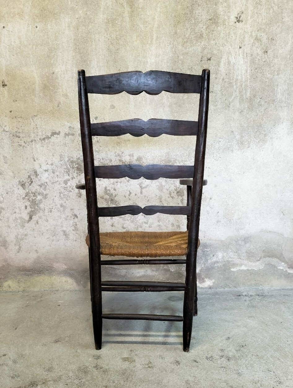 High back straw armchair