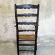 High back straw armchair