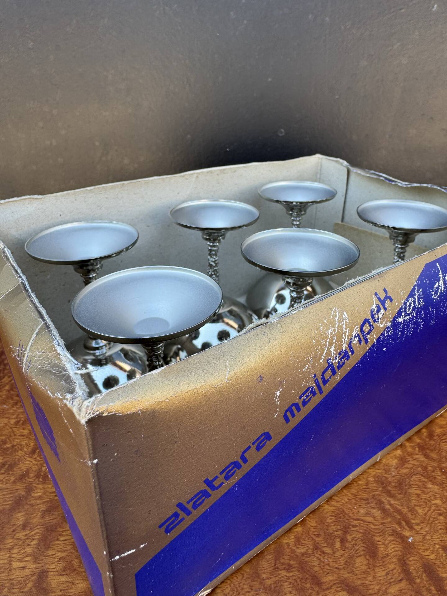 Silver-plated metal wine glasses on stems from the 1970s.