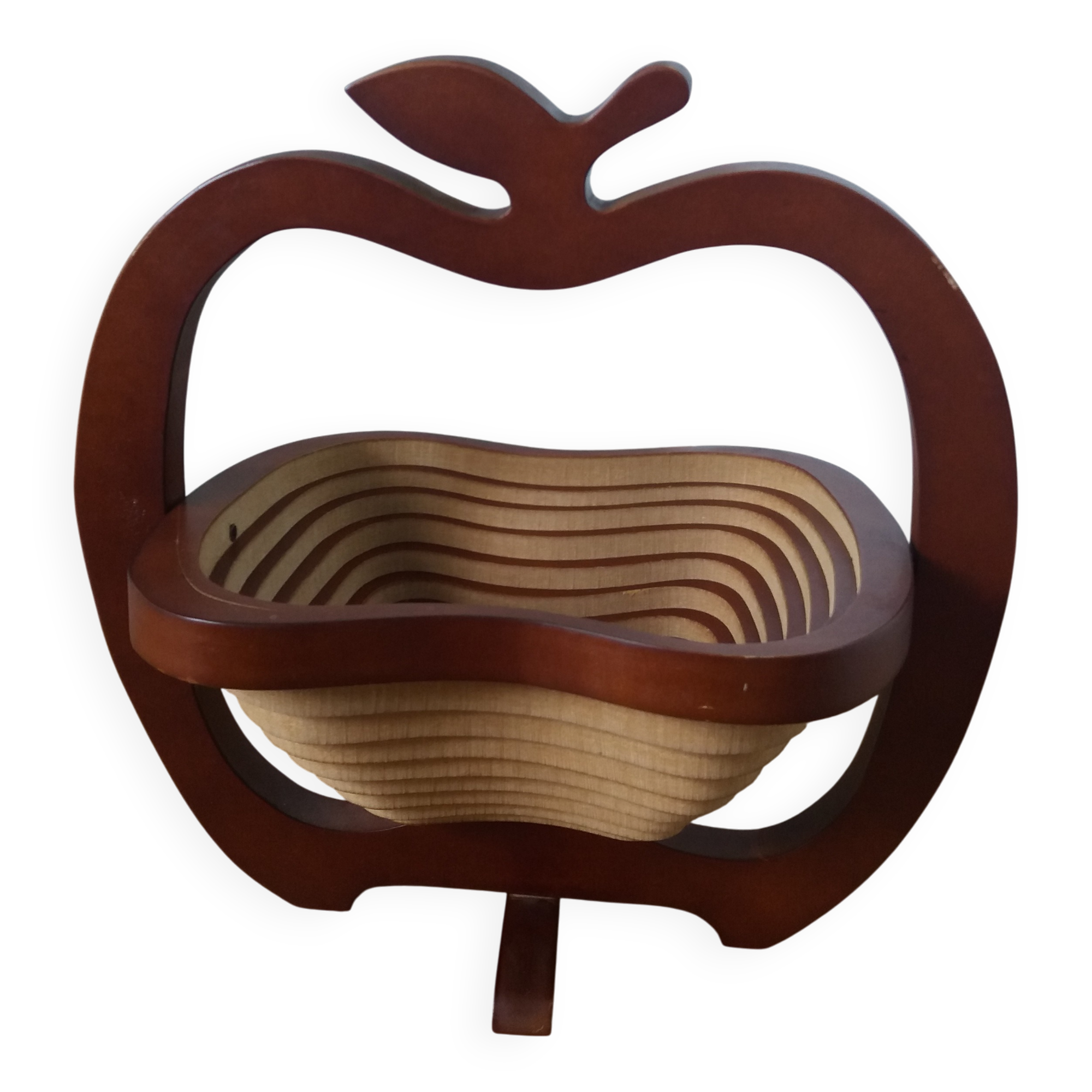 Foldable fruit basket in the shape of an apple.
