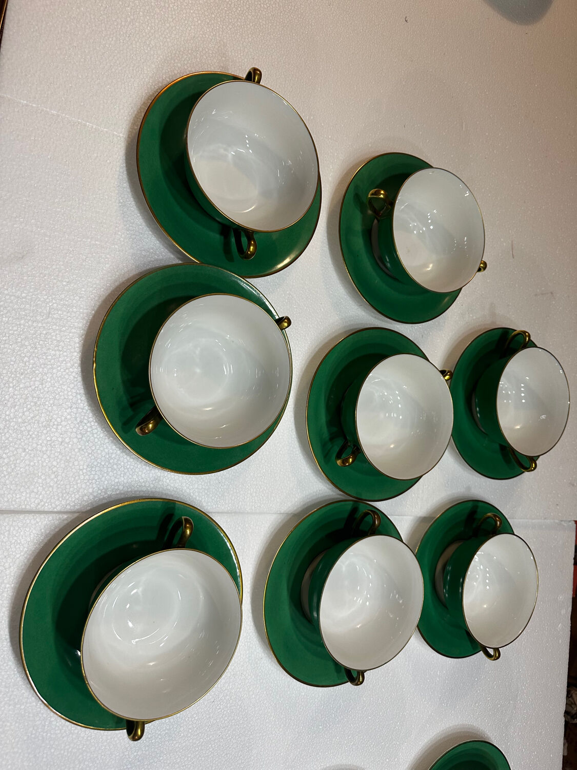 Service 14 cup and saucer in Art Deco Emerald Green and Gold.