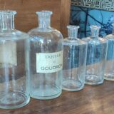 Series of 5 blown glass apothecary pharmacy bottles