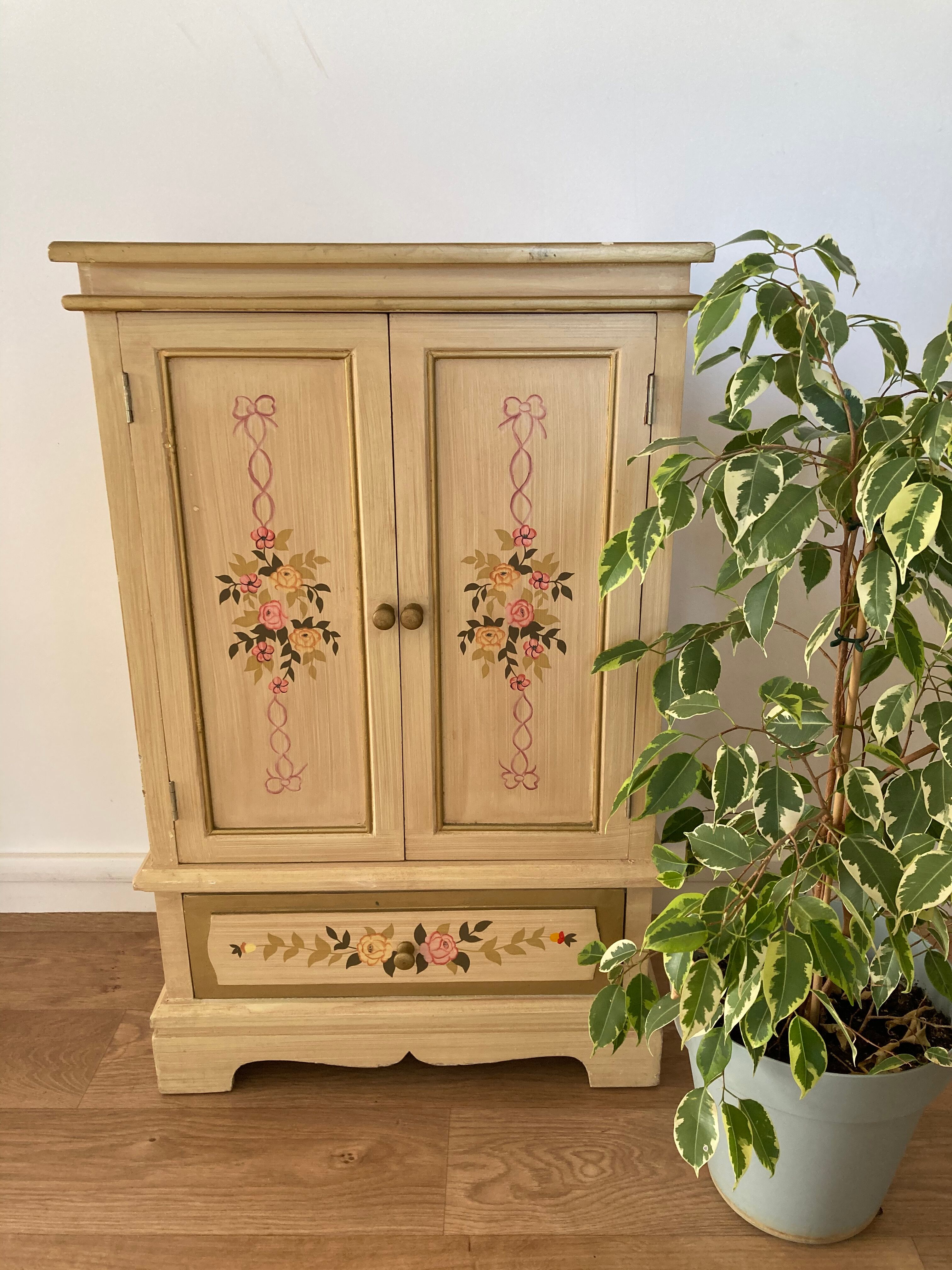 2-door flowered wooden cabinet